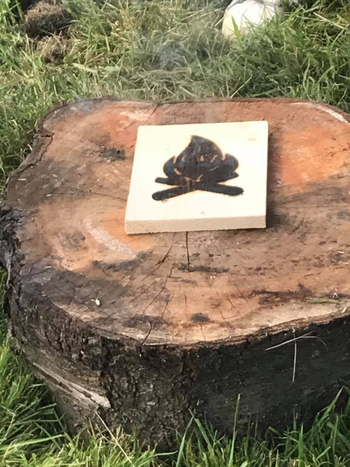 Wood branding using the Challenge 17 logo...